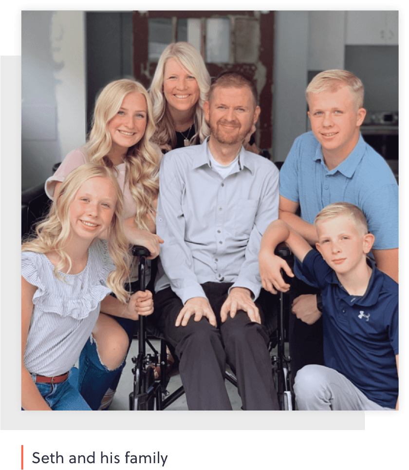 Man living with ALS with family